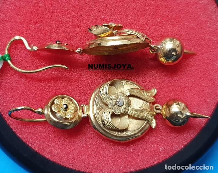 Joyeria: A&ntilde;o 1900. Pendientes de Oro 18 quilates 2 Perlitas de alj&oacute;far. 8,00 gr. 50 mm., m&aacute;s el cierre.