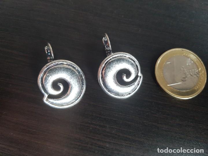 Joyeria: Pendientes de metal con espiral - Foto 1