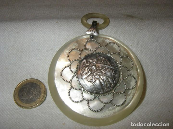 Joyeria: Medalla de cuna de plata contrastada y nacarina. - Foto 1