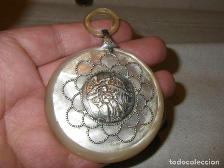 Joyeria: Medalla de cuna de plata contrastada y nacarina. - Foto 3