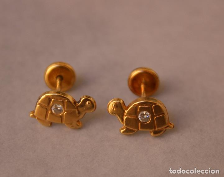 Joyeria: pendientes tortuga oro 18k.