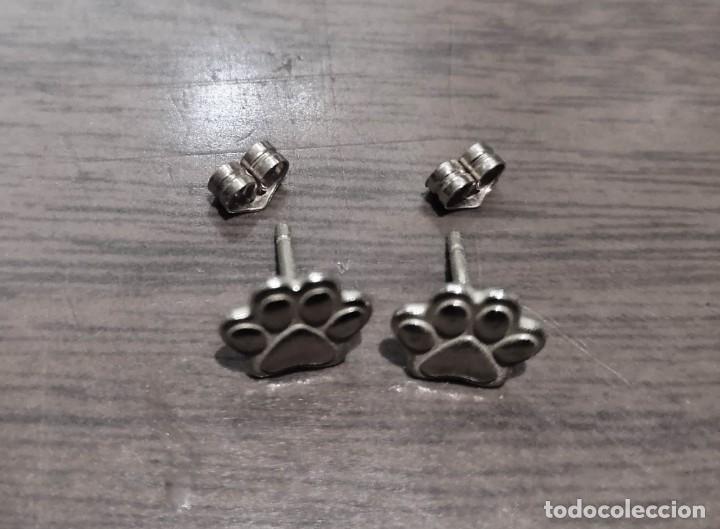 Joyeria: pendientes huellas de perro en plata de ley - 7x8mm - Foto 1