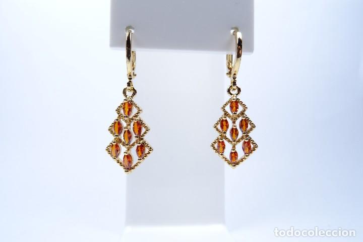 Joyeria: PENDIENTES LARGOS EN ORO DE 14K CON GRANATES - Foto 1