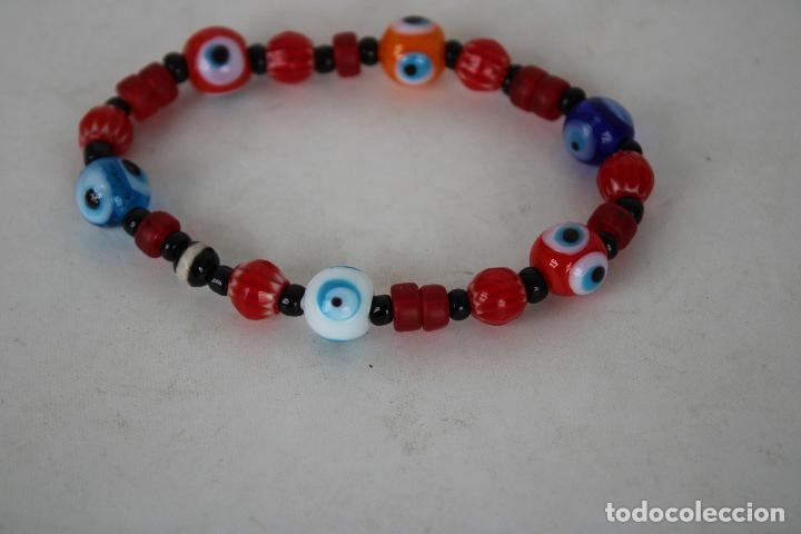 Joyeria: pulsera elastica con cuentas de cristales ojo turco - Foto 2