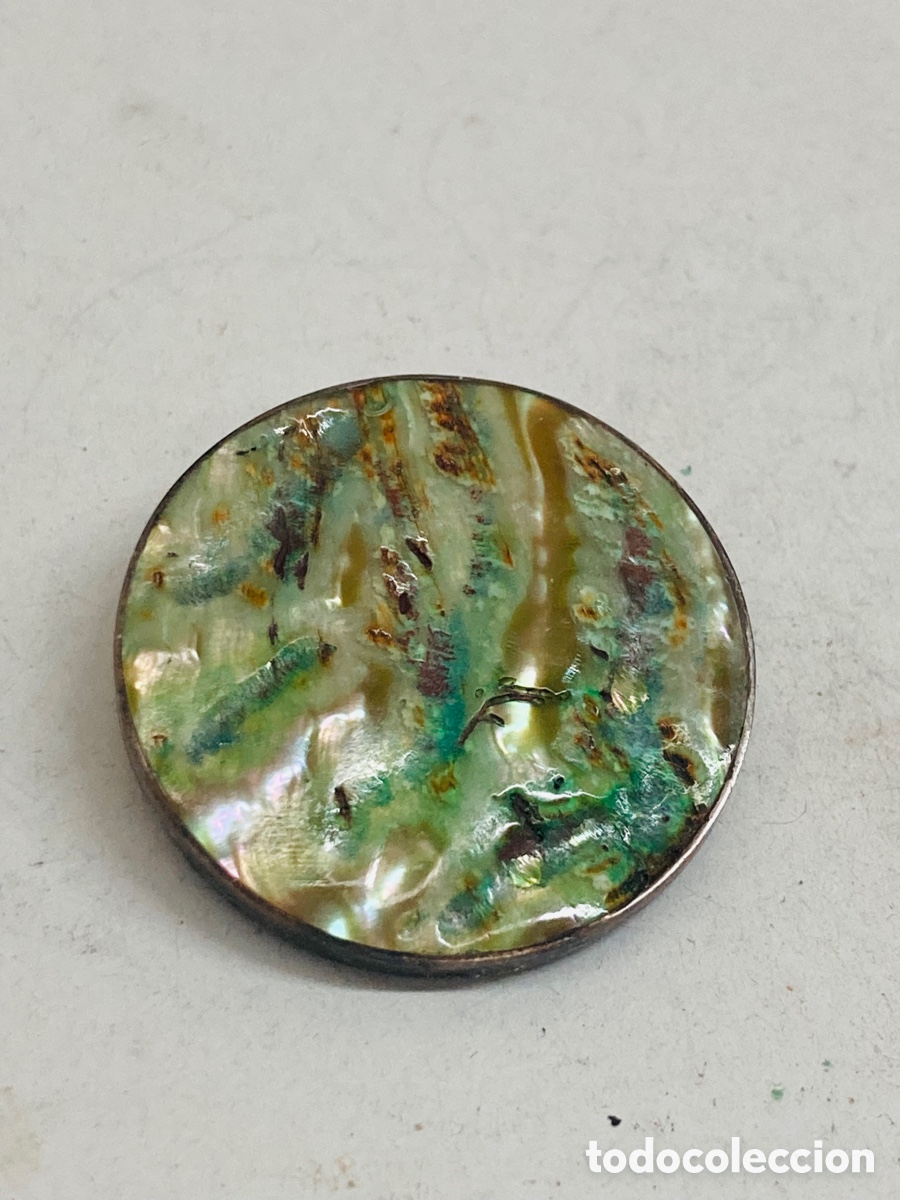 Jewelry: Colgante de plata y n&aacute;car