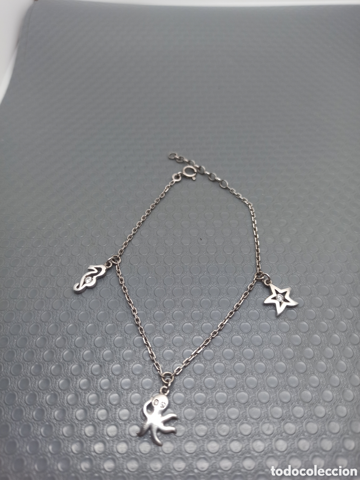 Joyeria: Pulsera en plata de ley 925 con dijes - Foto 1