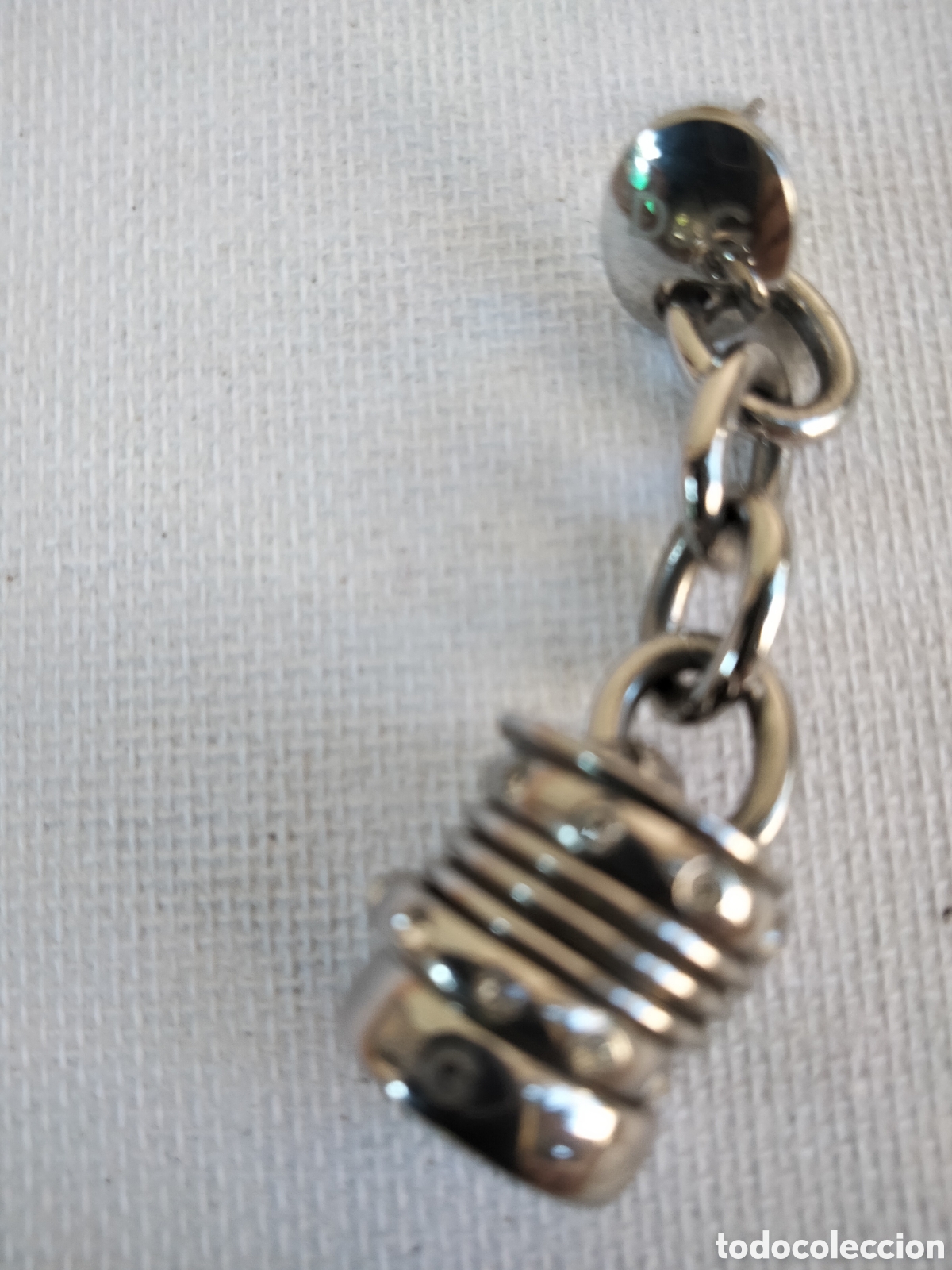 Joaillerie: Pendiente Dolce Gabbana acero y peque&ntilde;as chispas de cristal de roca