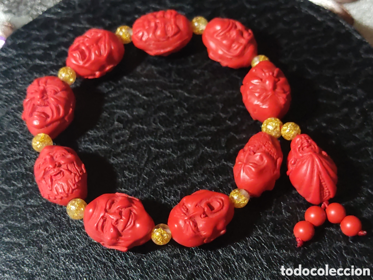 Schmuck: Pulsera de cinabrio rojo,caras de 18 sabios o dioses orientales tallados,Buda.Made in Taiwan.