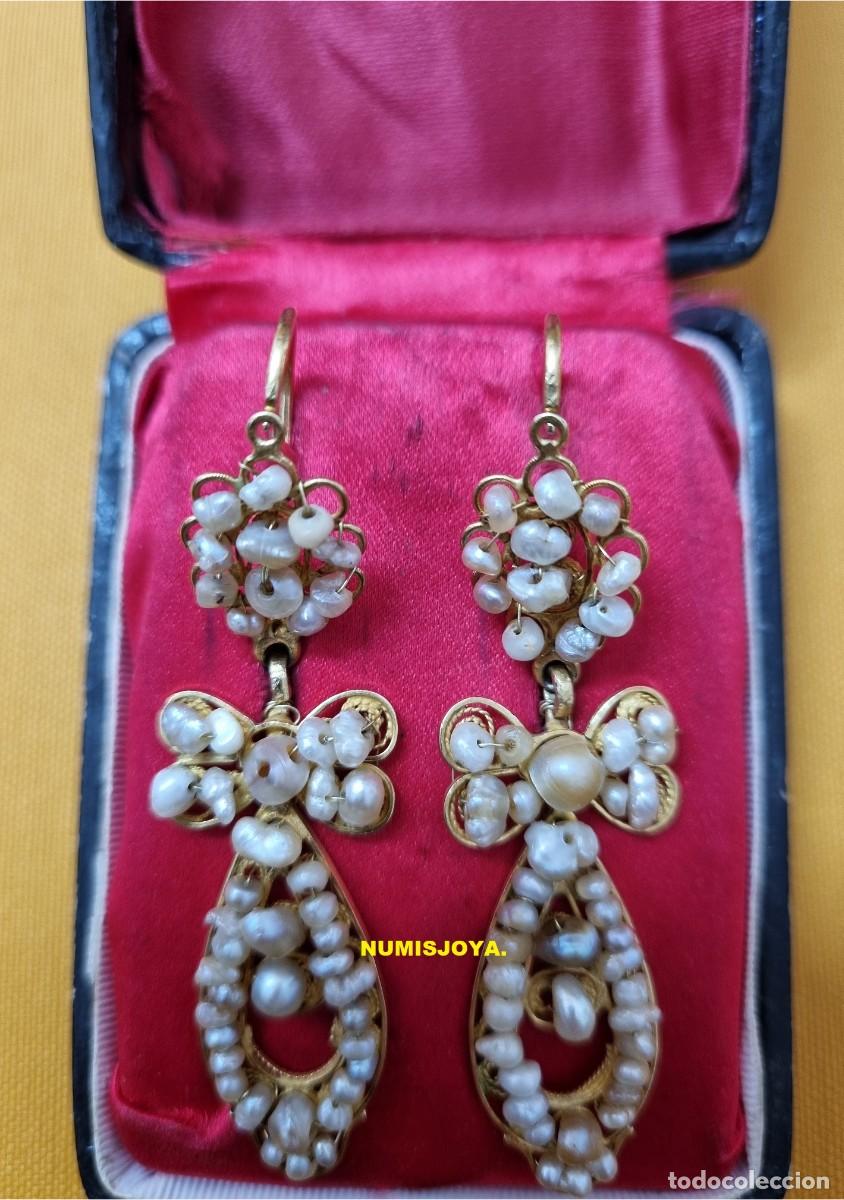 Schmuck: Siglo XIX Pendientes regionales Oro 18 quilates y Perlas de alj&oacute;far. Peso 10,25 gr. Largo 56 mm.