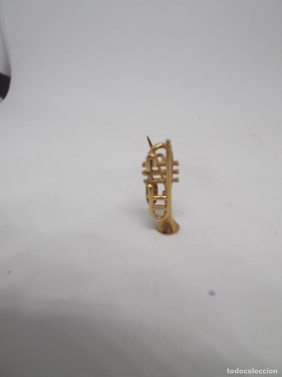 Joyeria: Aguja de trompeta en oro amarillo de 18 Kt. - Foto 1