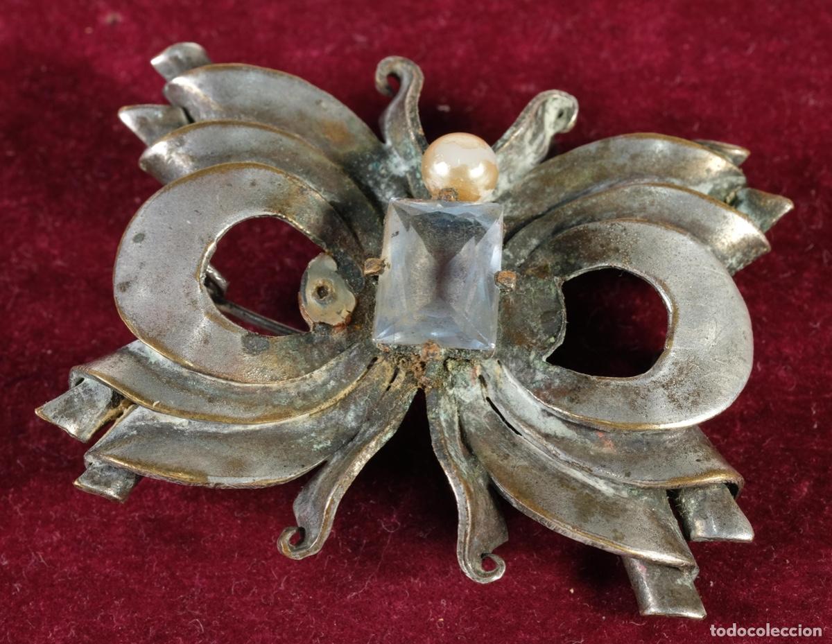 Joyeria: Broche en metal con aguamanil - Foto 1