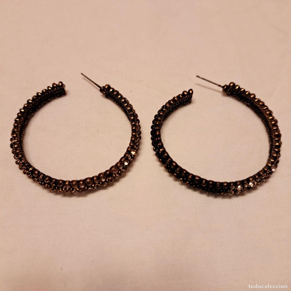 Gioielleria: Pendientes dorados y cristal