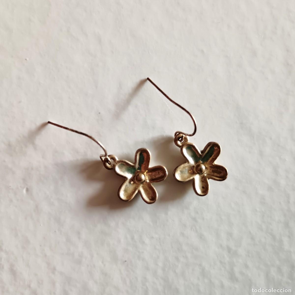 Gioielleria: Pendientes plateados flor