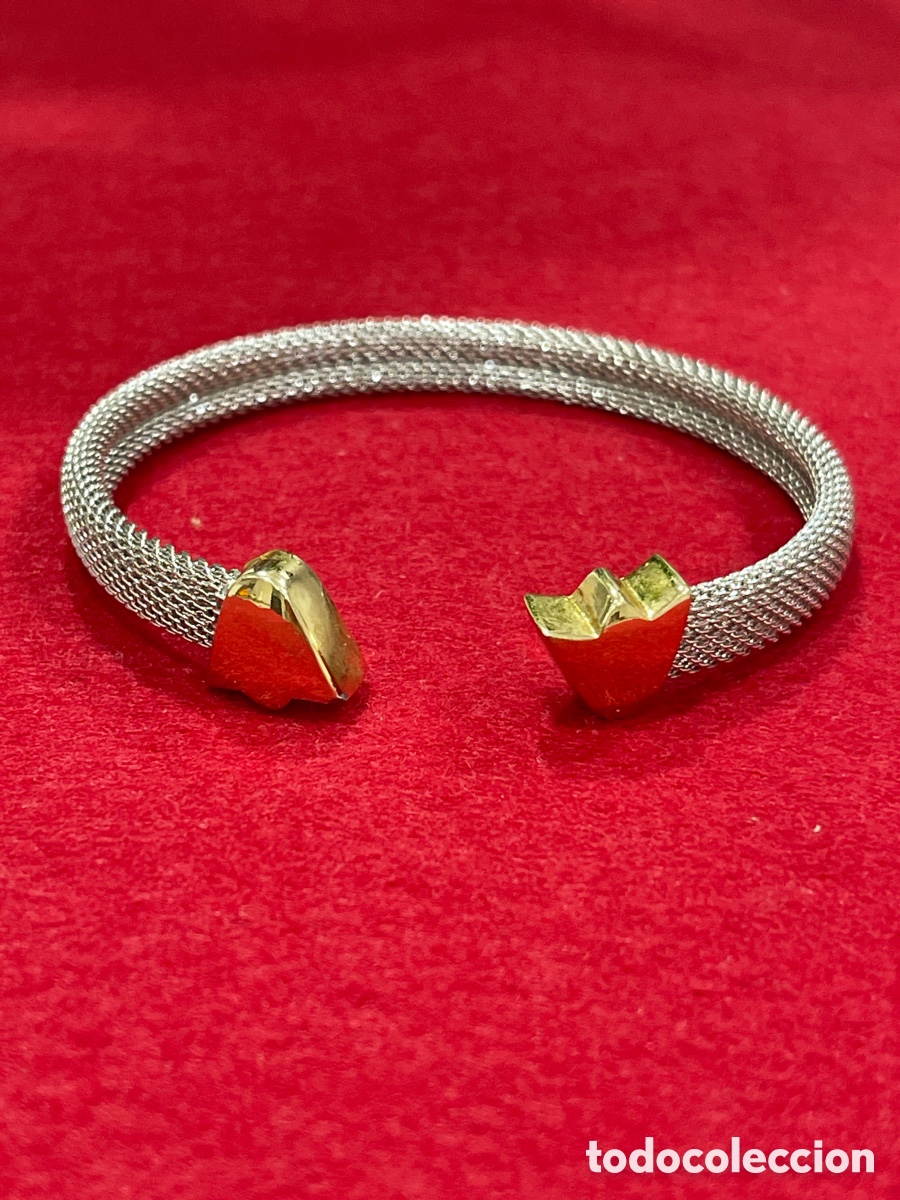 Joyeria: Pulsera en acero y terminaciones chapadas en oro. - Foto 1