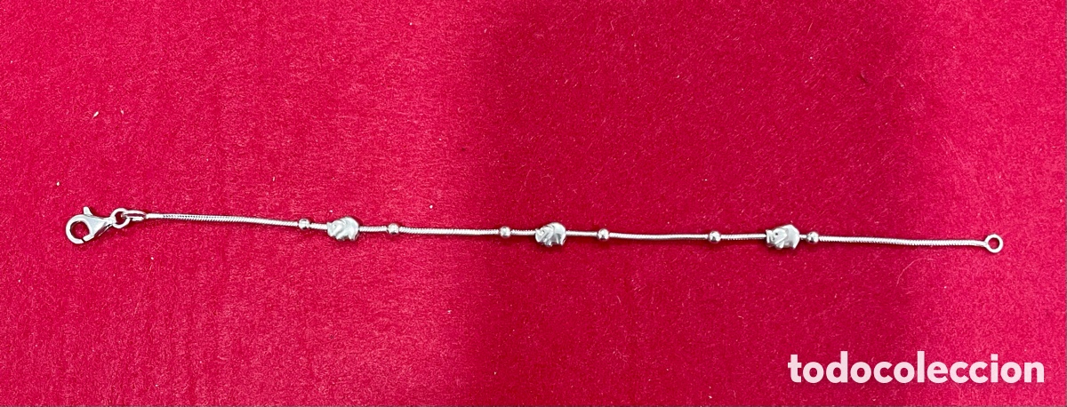 Joyeria: Pulsera en plata de ley contrastada decorada con elefantes. - Foto 1