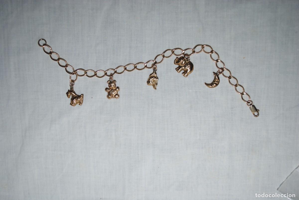 Joyeria: PULSERA DORADA CON COLGANTES EN FORMA DE ANIMALES . - Foto 1