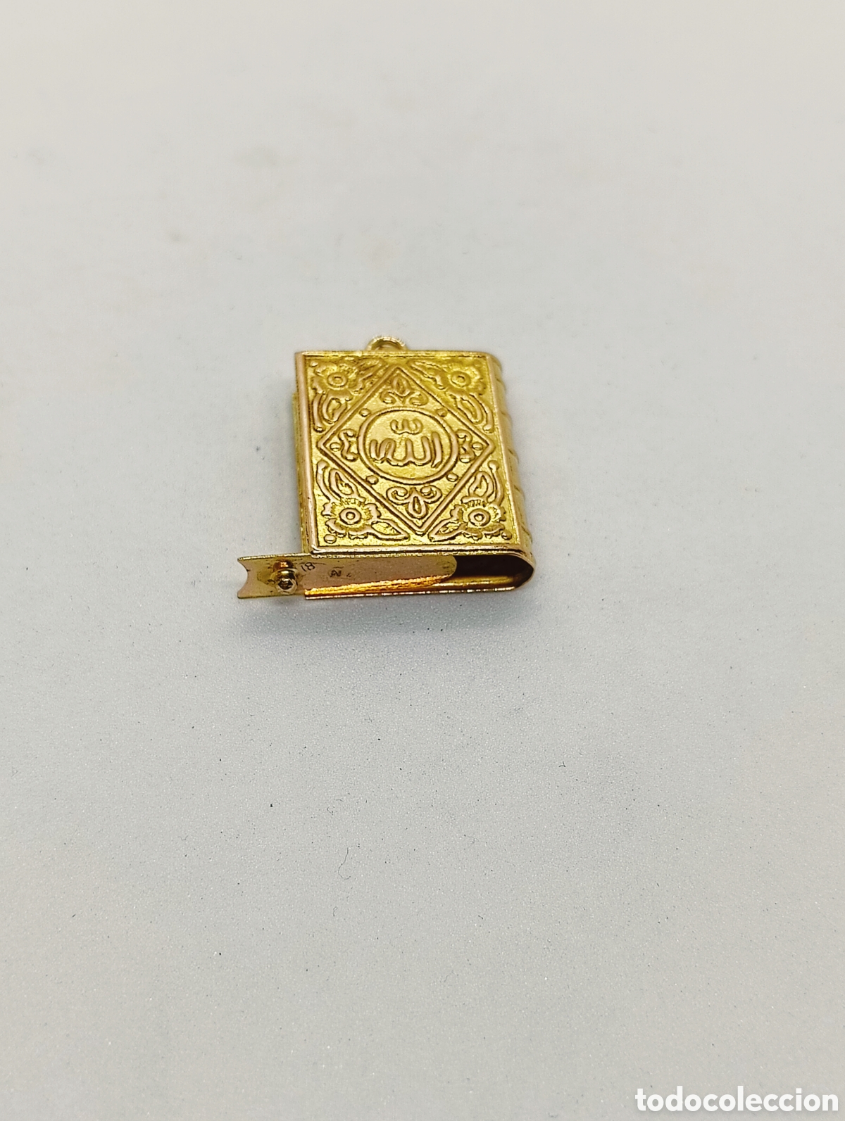 Joyeria: Colgante libro en oro 18kts. 3,65grms. - Foto 1