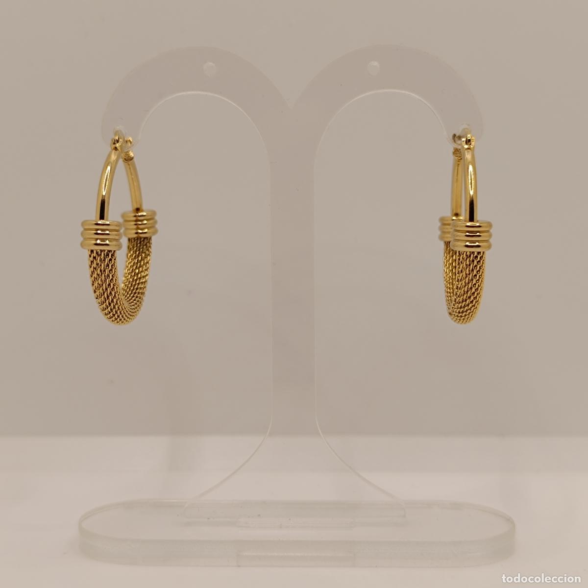 Joyeria: Pendientes sofisticados de corte elegante tipo aro con acabados en oro de 18k. - Foto 7