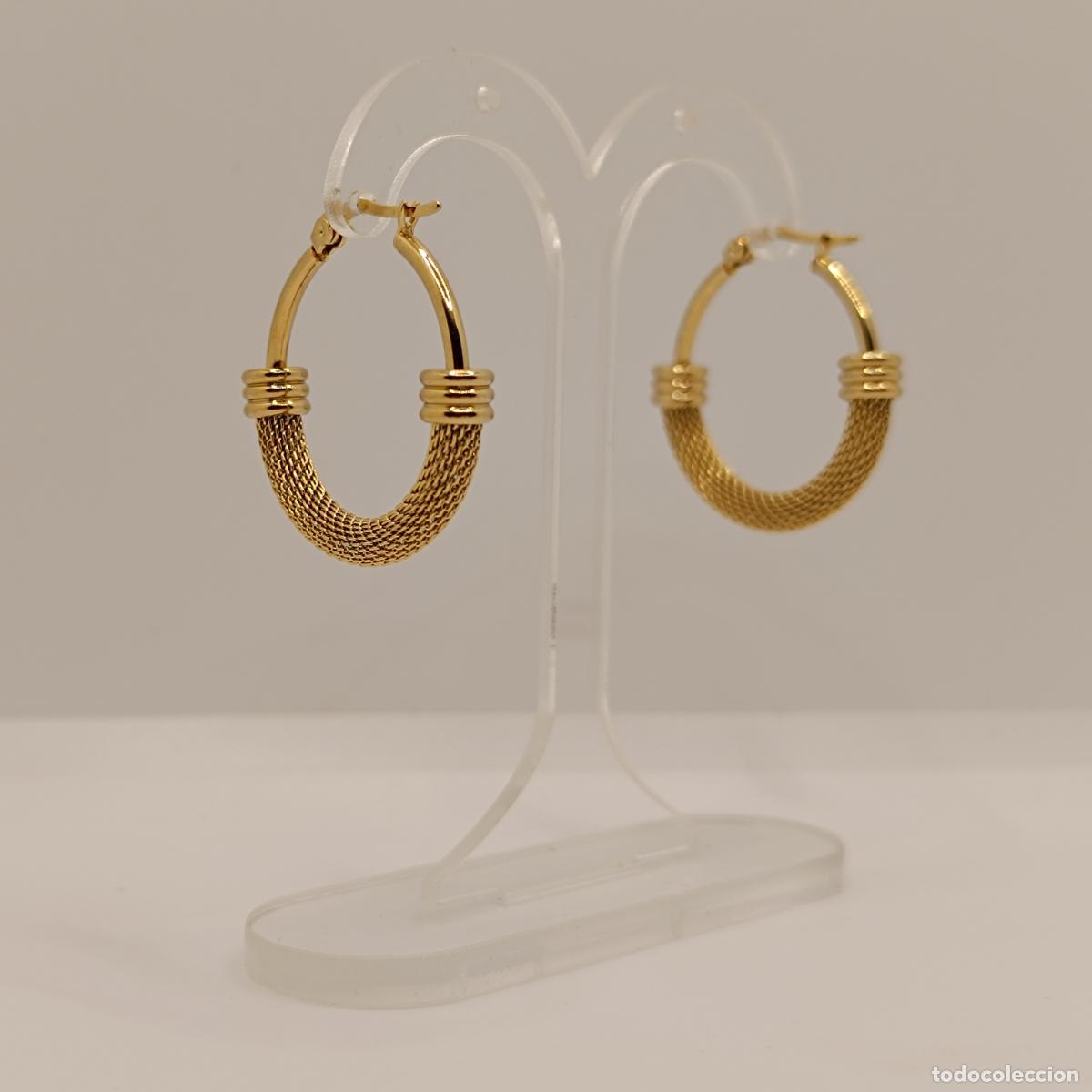 Joyeria: Pendientes sofisticados de corte elegante tipo aro con acabados en oro de 18k. - Foto 10