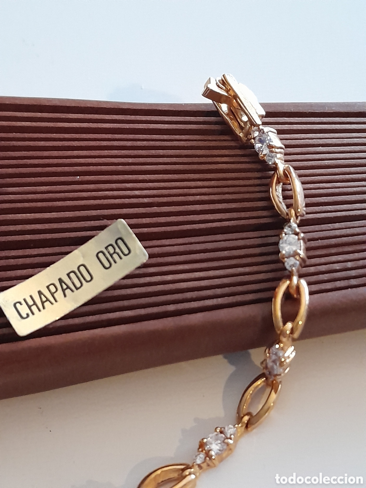 Joyeria: PULSERA CON CIRCONIOS CHAPADA EN ORO - Foto 1