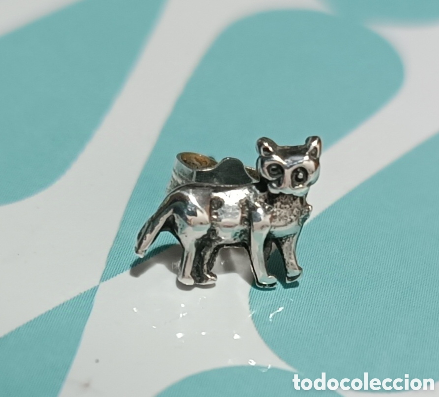 Joyeria: PENDIENTE en forma de PERRO, en plata. - Foto 1
