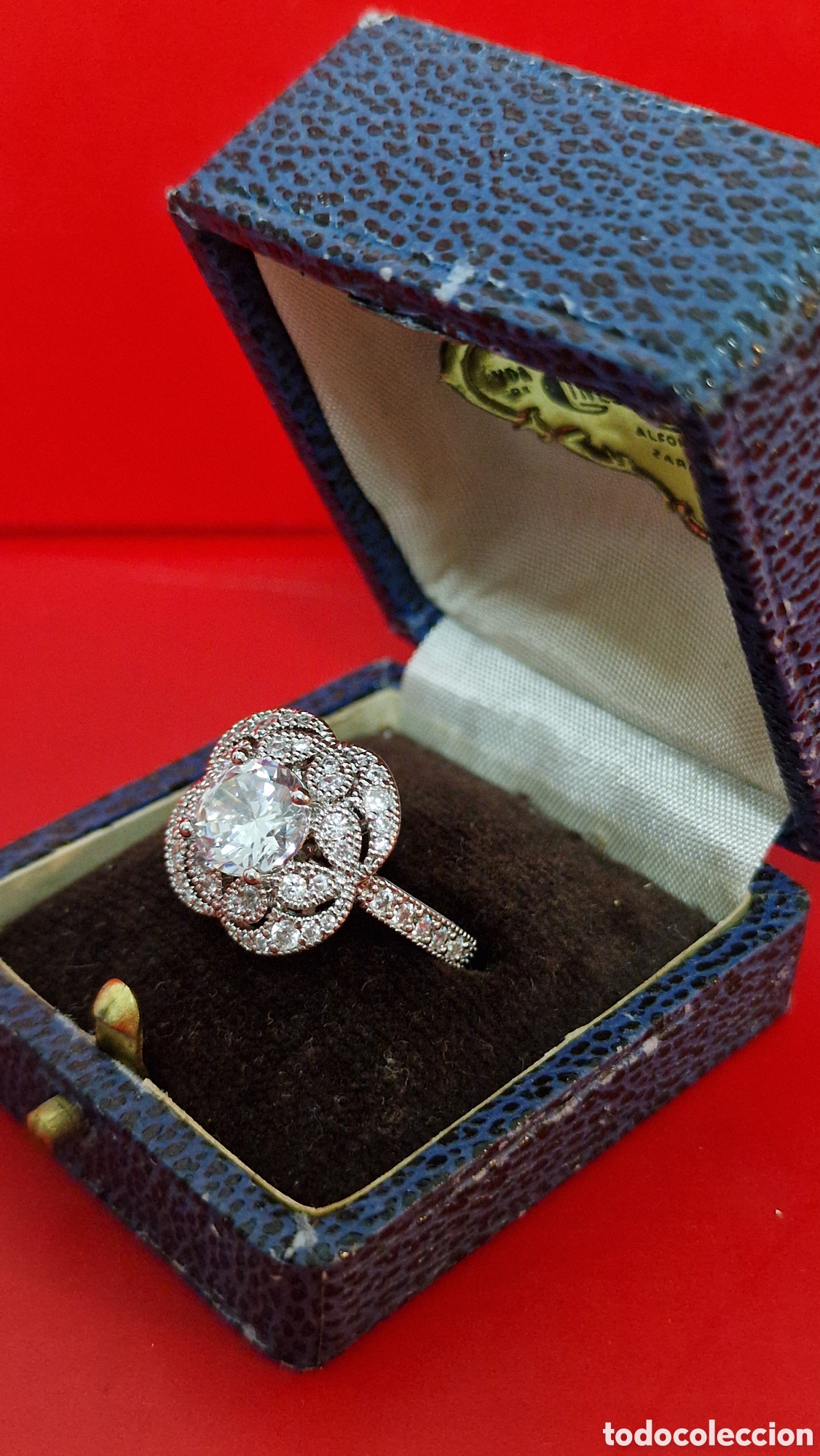 Joyeria: Anillo con forma de flor plateado con circonitas - Foto 1