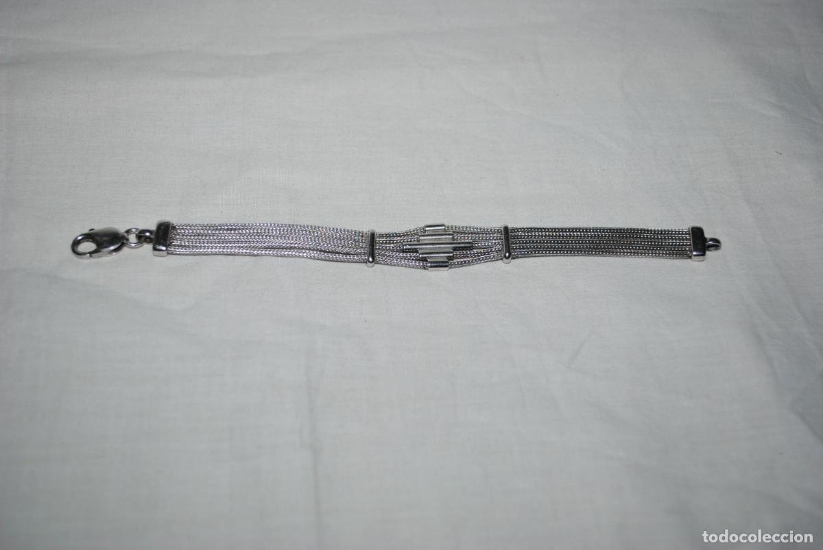 Joyeria: PULSERA DE CUATRO TRENSA DE PLATA . - Foto 1