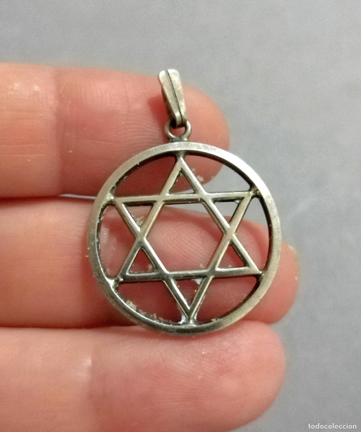 Joyeria: Colgante de plata de ley contrastada estrella. - Foto 1
