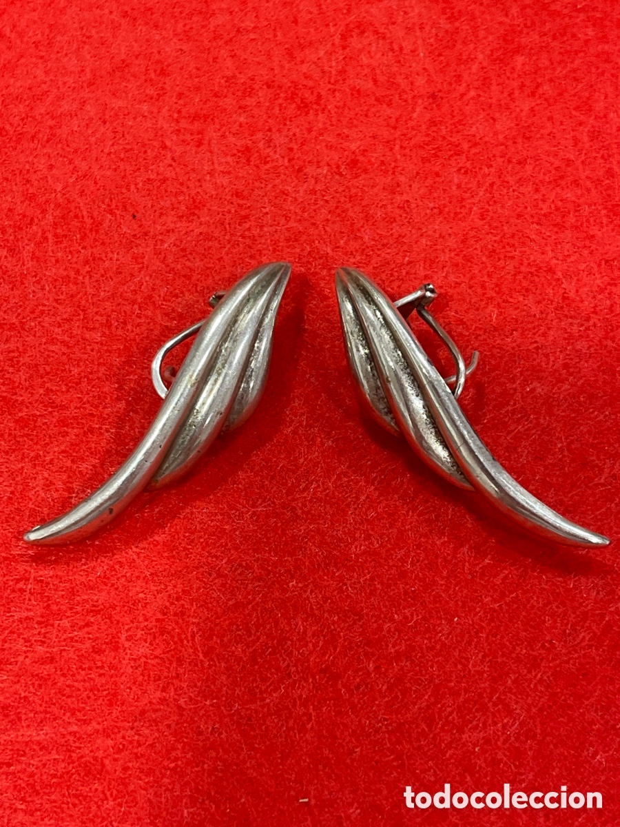 Joyeria: Pendientes en forma de ala en plata de ley. - Foto 1