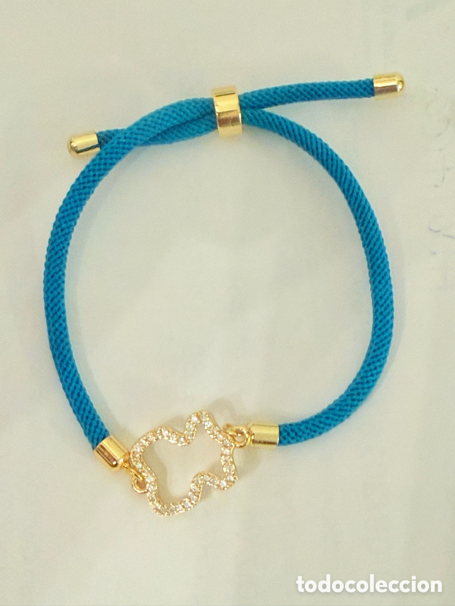 Joyeria: Pulsera dorada y celeste con nudo - Foto 1