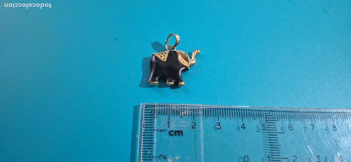 Joyeria: Colgante con forma de elefante. Negro y dorado - Foto 3