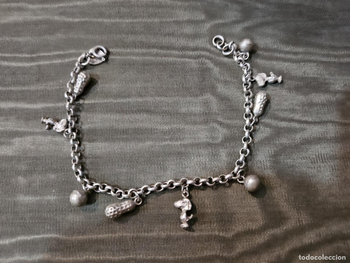 Joyeria: pulseras plateadas con figuras - Foto 1