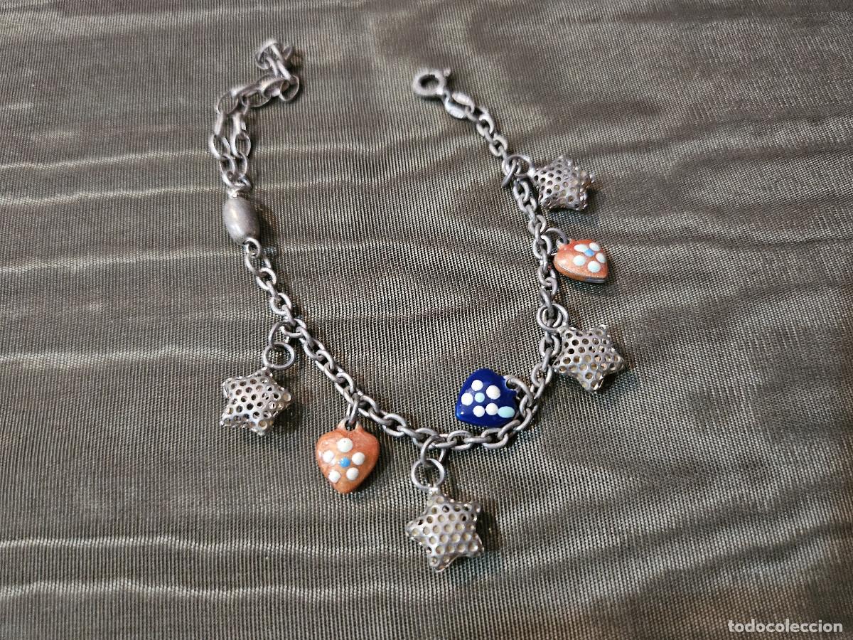 Joyeria: pulsera plateada con figuras - Foto 1