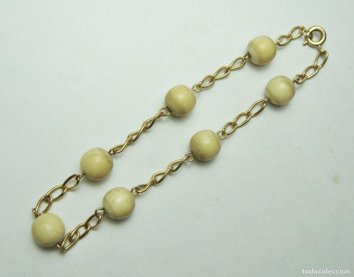 Joyeria: Pulsera en oro de 18 k con cuentas de hueso - Foto 1