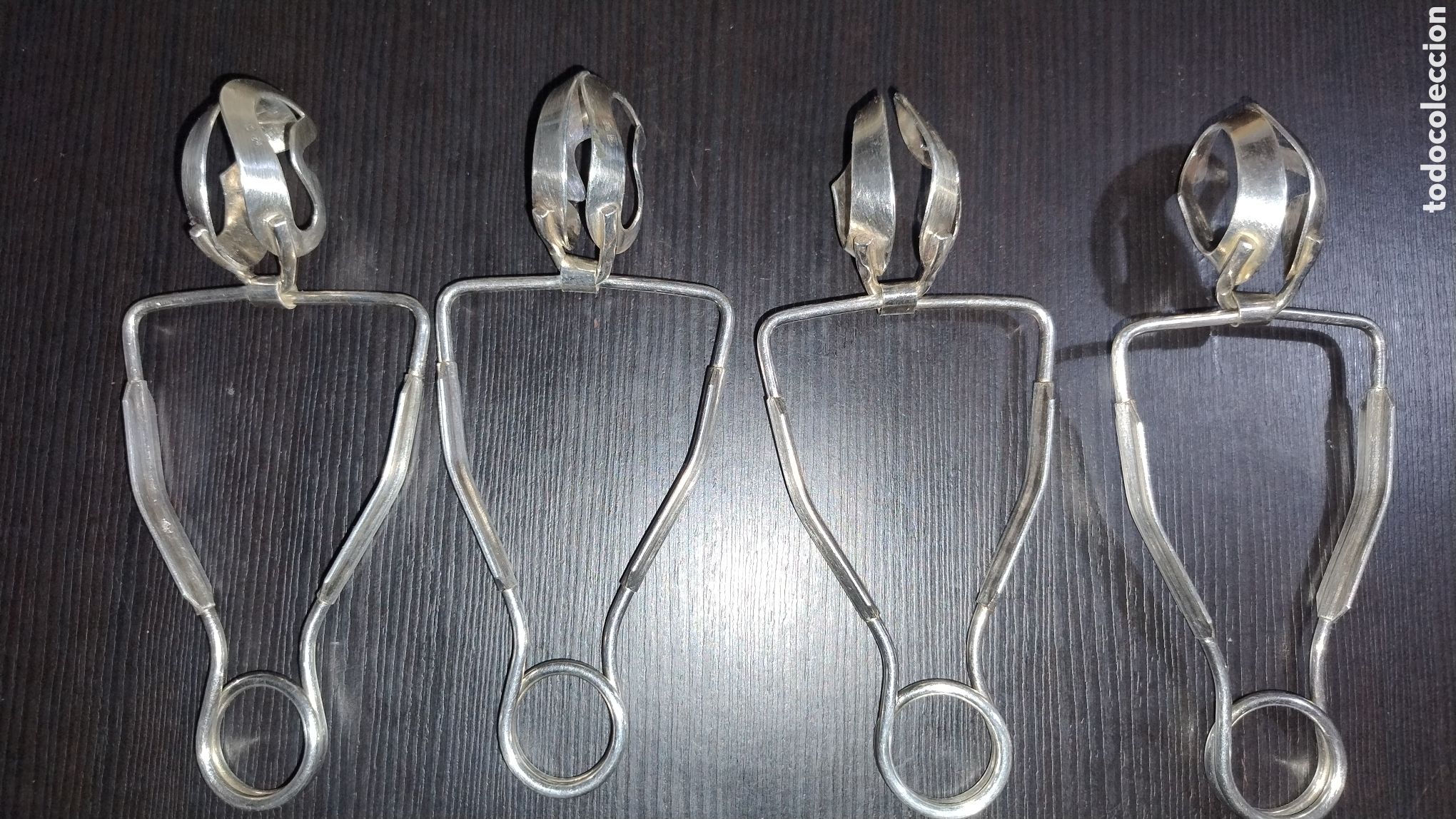 Joyeria: Pinzas de plata para sujetar caracoles - Foto 1