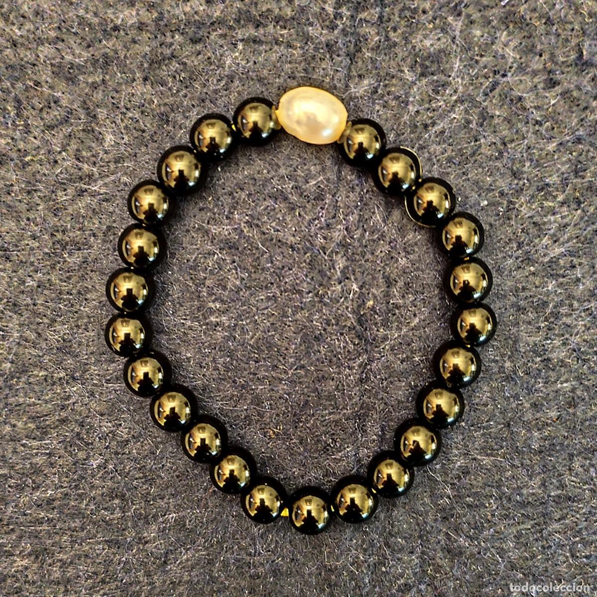 Schmuck: PULSERA ELASTICA BOLAS DE ONICE 8,5 MM Y PERLA CULTIVADA