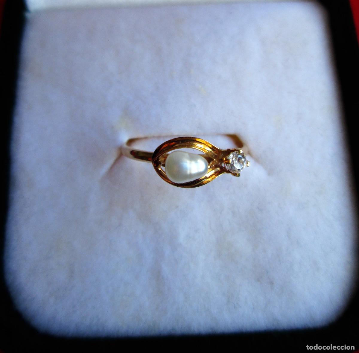 Joyeria: ANILLO DE ORO DE 18 KLTS CON PERLA Y CIRCONITA - SIN ESTRENAR -