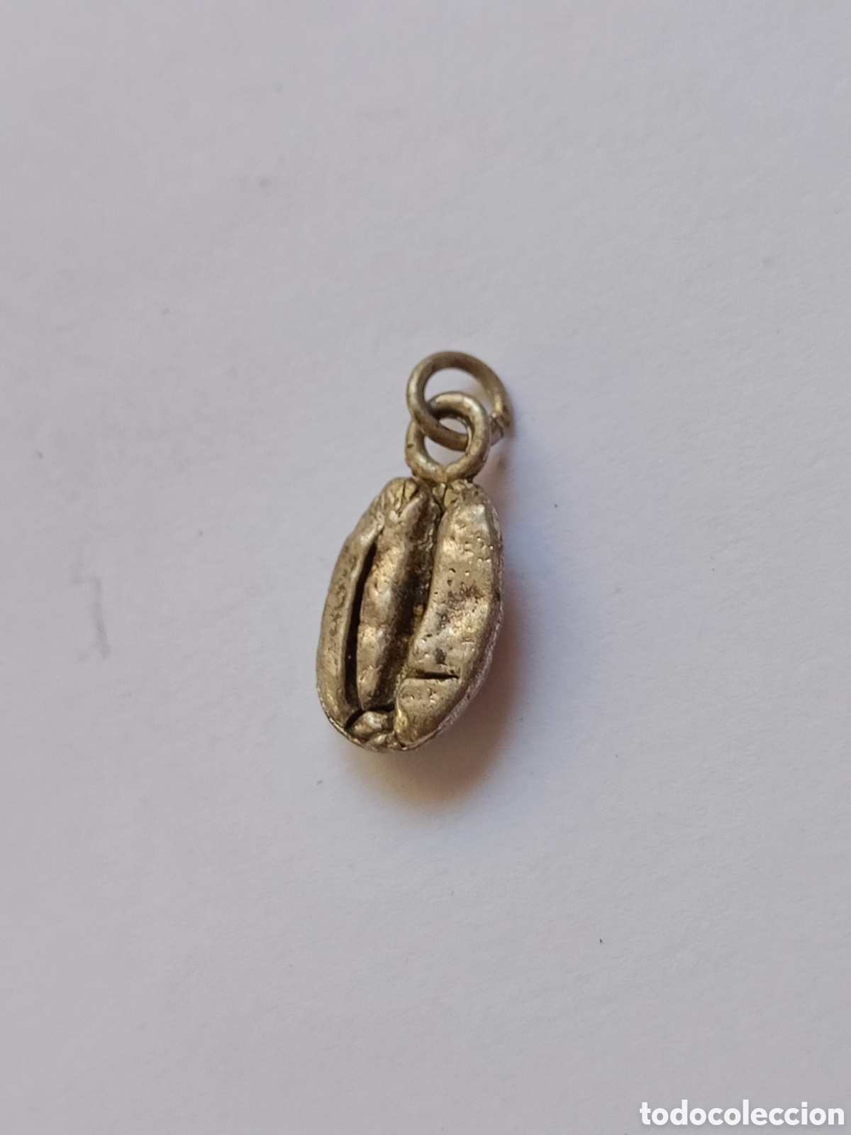 Schmuck: Colgante grano de caf&eacute; plateado