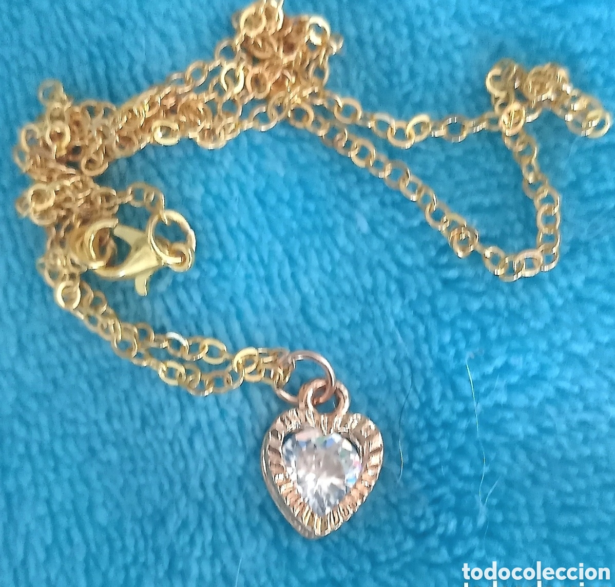 Joaillerie: Original colgante coraz&oacute;n en relieve dorado con incrustacion brillante 1cm + cadena. Muy bonito