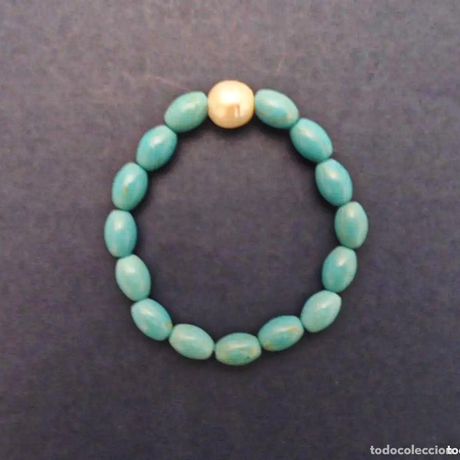 Joaillerie: PULSERA ELASTICA DE PIEZAS OVALES DE TURQUESA 12 X 8 MM Y PERLA CULTIVADA 11 MM
