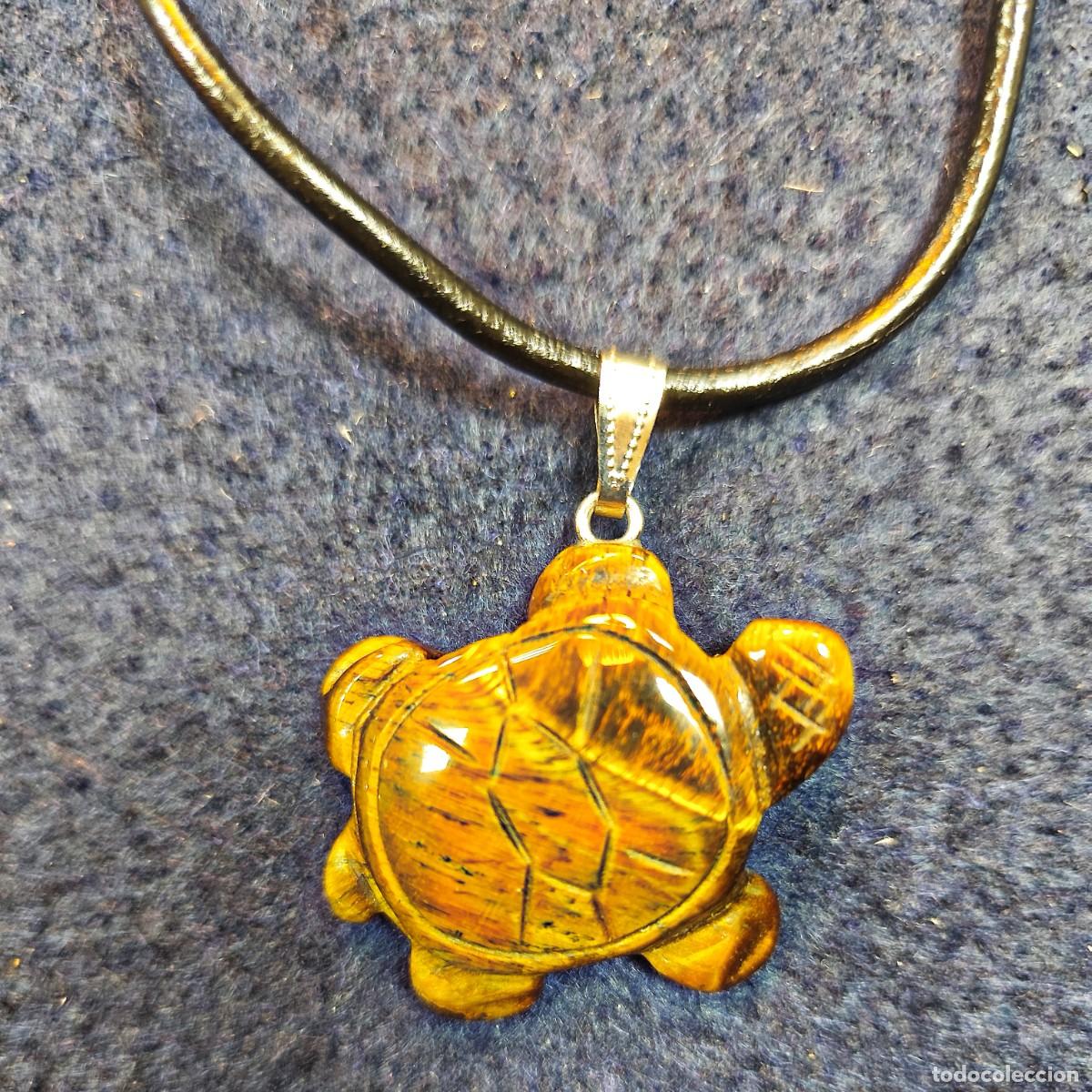 Joaillerie: COLGANTE DE ALPACA OJO TIGRE TORTUGA. MED. 50 x 40 MM