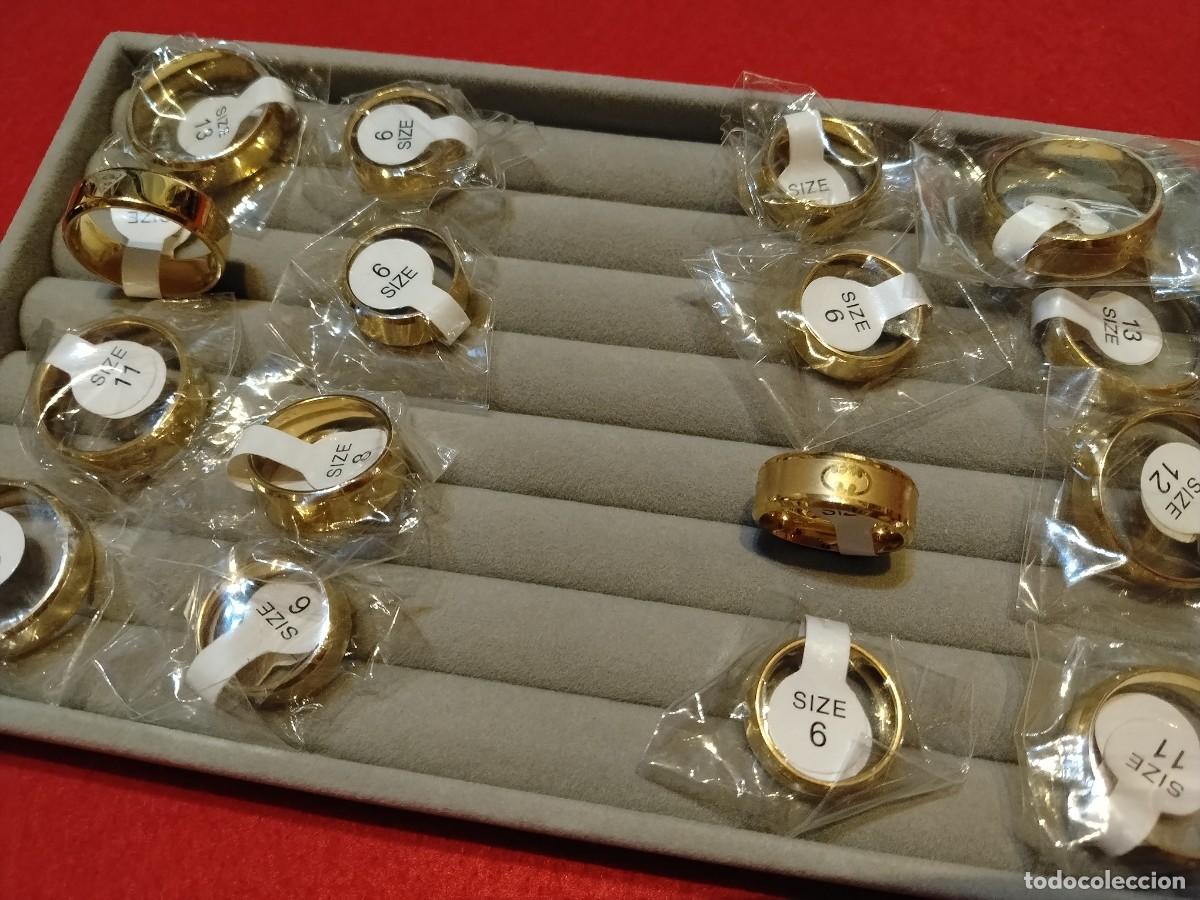 Joyeria: PANEL CON 8 ANILLOS BATMAN Y 8 DE SUPERMAN EN GOLD FILLED 14K,DIFERENTES MEDIDAS.
