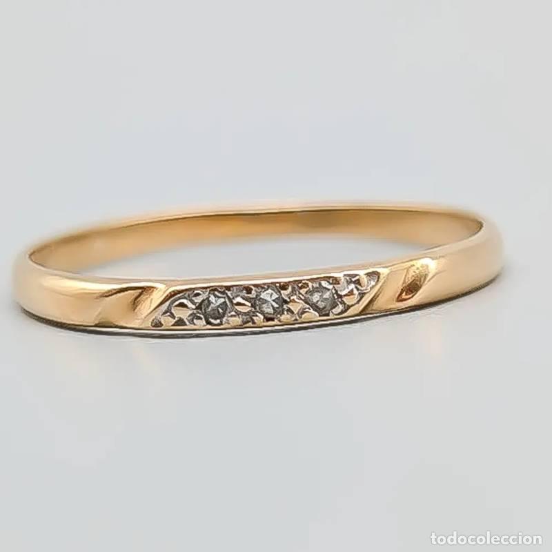 Joyeria: Anel Carmos&eacute; em ouro 18 quilates com diamantes e safira, 1,8 gramas, 16,75mm