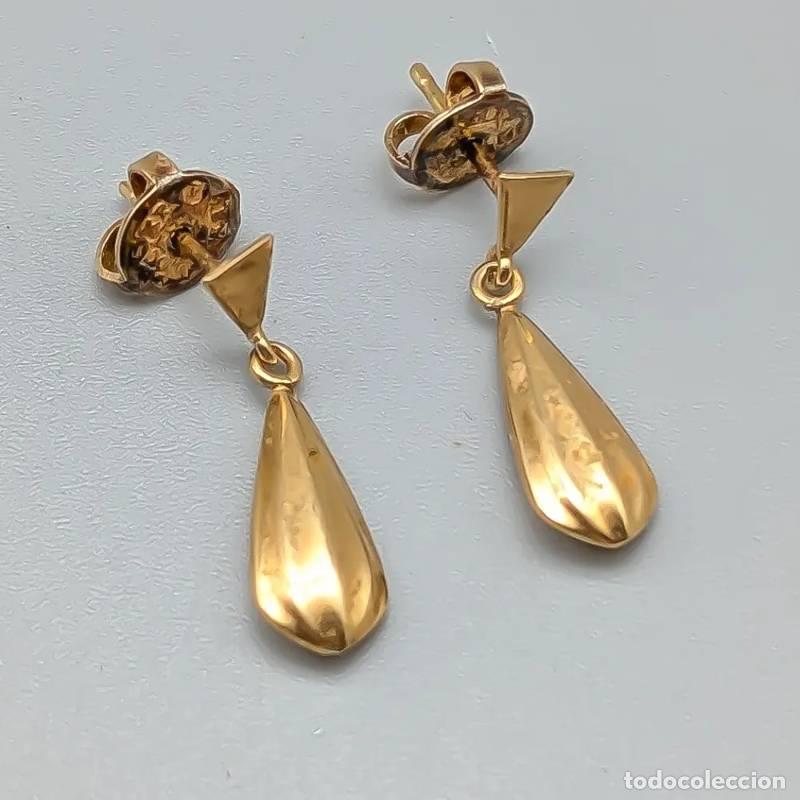 Joyeria: Brincos em ouro 18 quilates com pedras roxas e verdes, 1,65 gramas, 37mm