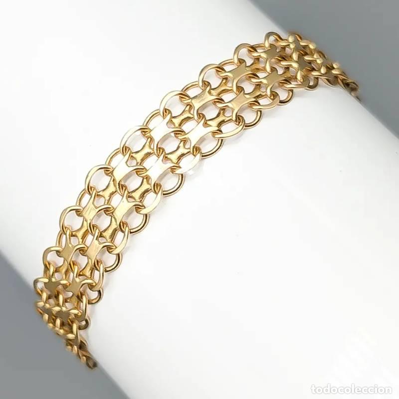 Joyeria: Corrente curva em X de ouro 18 quilates de 19 cm com detalhe em a&ccedil;o inoxid&aacute;vel, 19,52 g