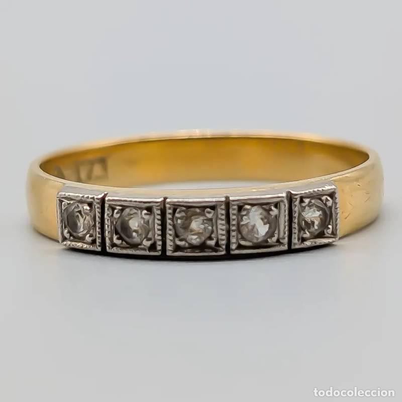 Joalharia: Anel em ouro com pedras brancas 18 quilates 6,89 gramas 16,75mm