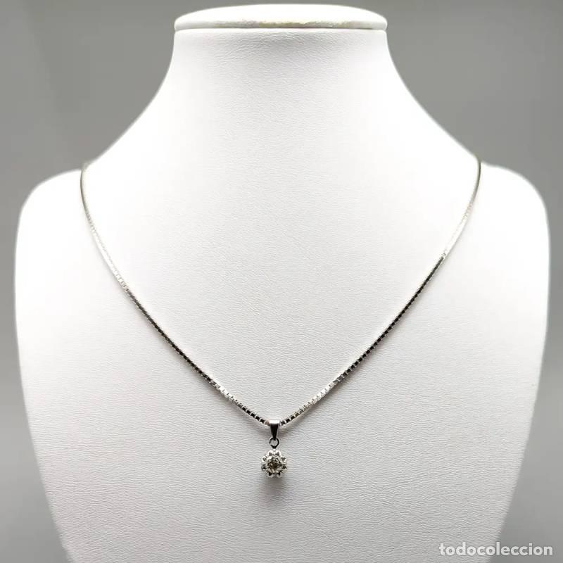 Joaillerie: Corrente Singapura de 45 cm em ouro com cora&ccedil;&atilde;o e pedra branca, 18 quilates, 1,65 g