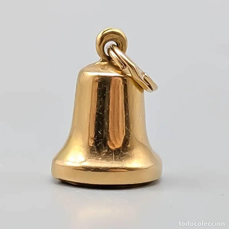 Joyeria: Pingente em ouro 18 quilates com golfinho e joaninha, 0,44 gramas, 10mm