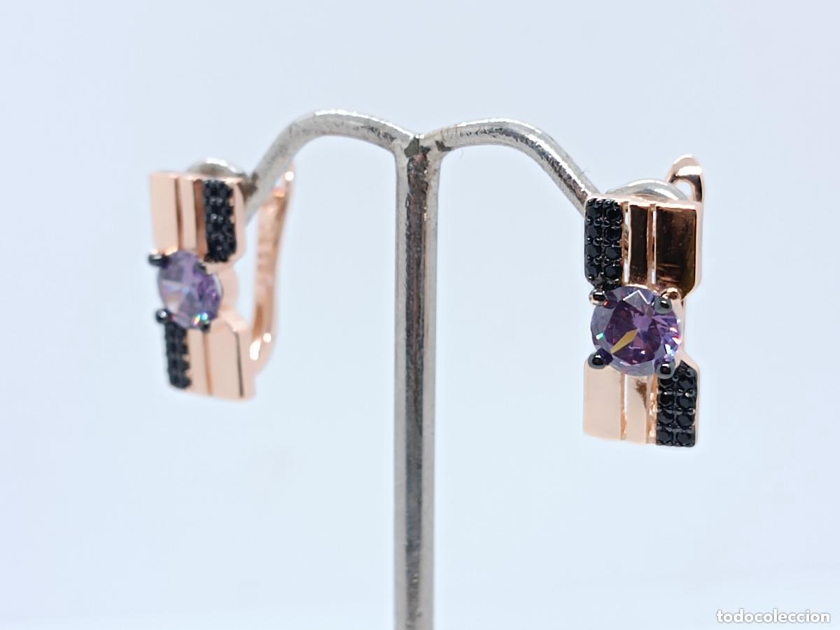 Joalharia: Elegantes pendientes en oro de 14k con amatistas talladas