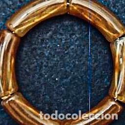 Joyeria: PUSERA ELASTICA CON PIEZAS DE RESINA O AMBAR SINTETICO ??. DORADO MATE